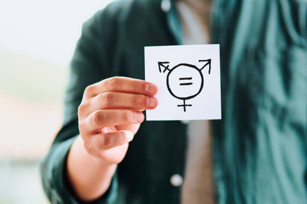 Gender neutral symbolism on piece of paper. (Gender Neutral Adjectives blog)