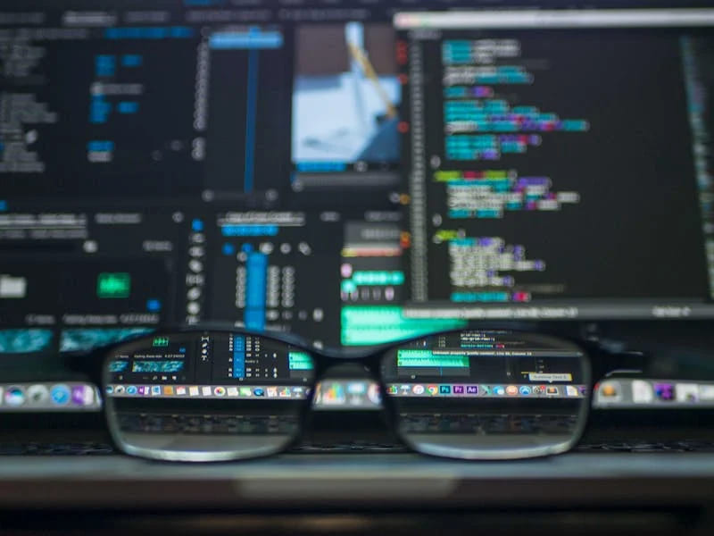 glasses over computer screens