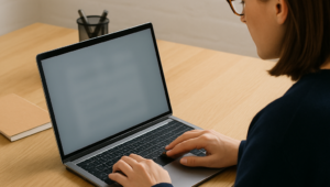 Woman Working at Wooden Desk