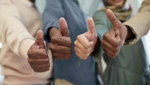four people giving thumbs-up for JD approval