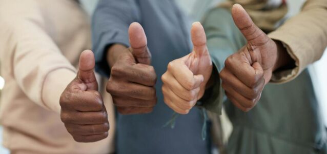 four people giving thumbs-up for JD approval